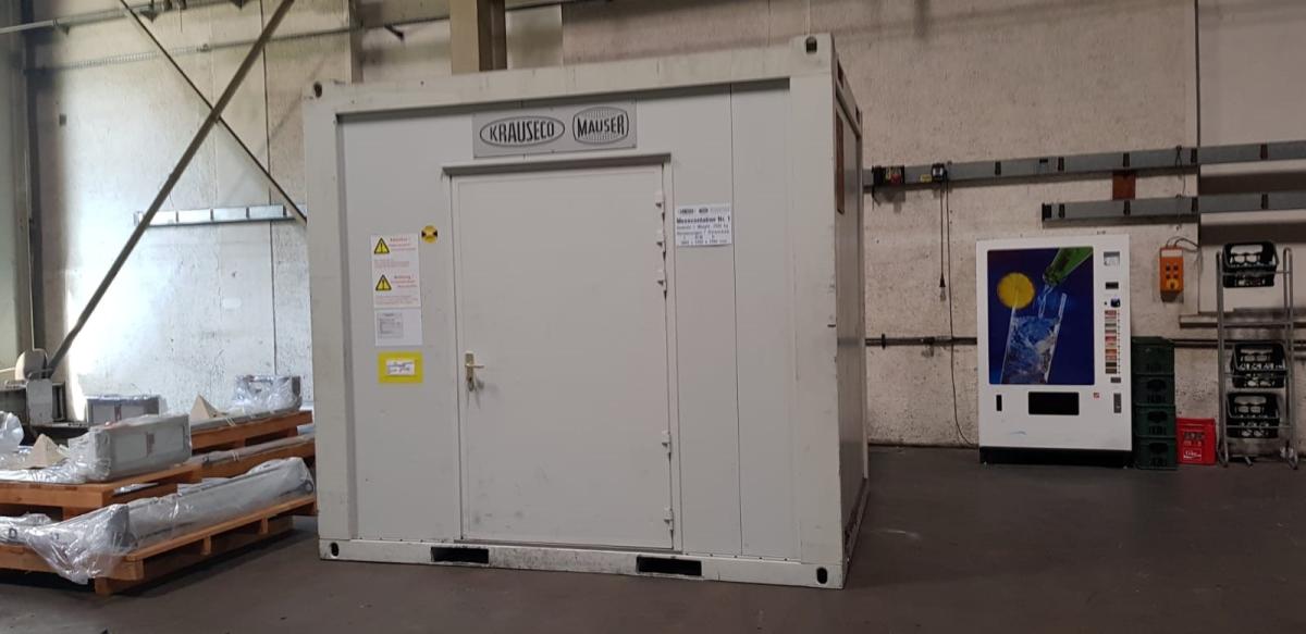 Measuring container (12)