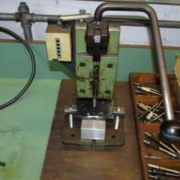 Toggle Press